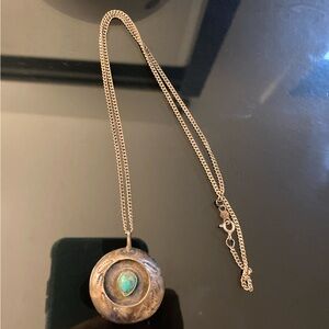 Authentic Native American “Zuni” necklace made of silver and turquoise.